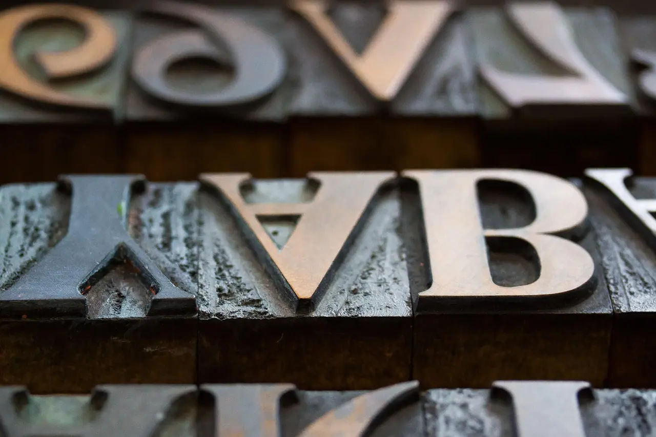 Photograph: letters, wooden letters, mirrored