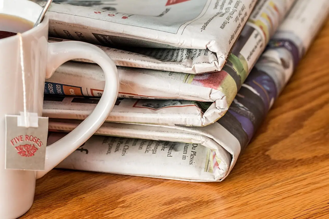 Photograph: newspaper, news media, print media