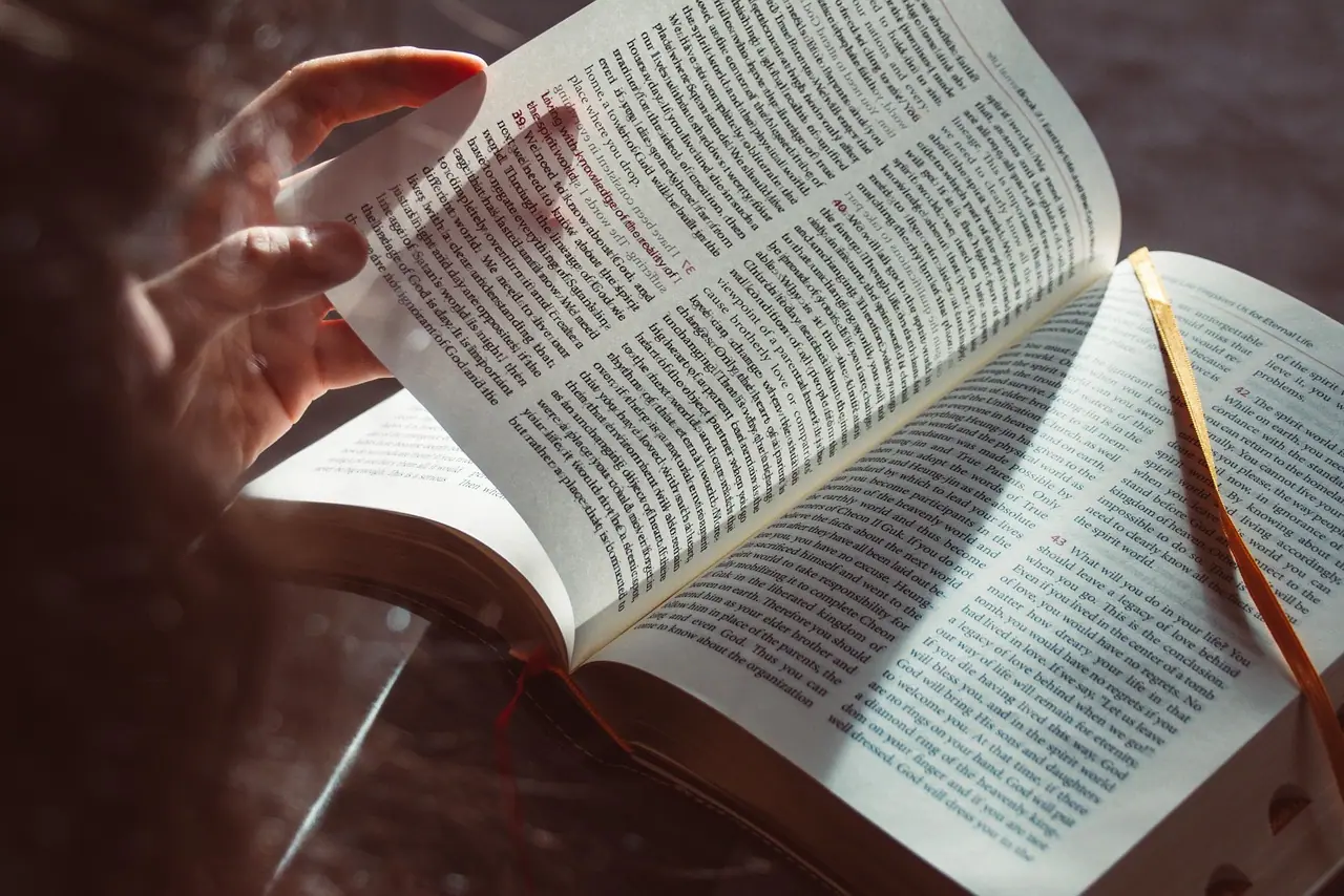 Photograph: book, scripture, read