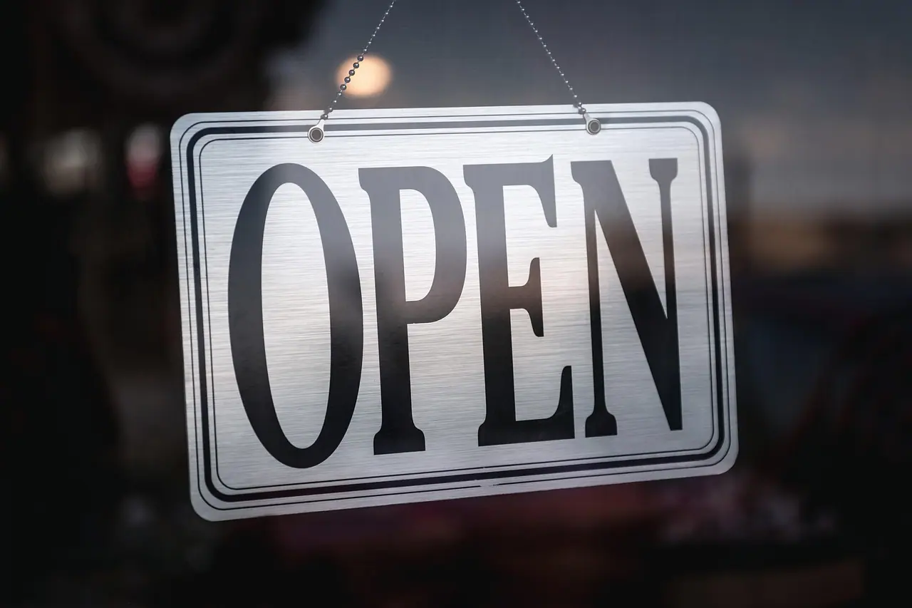 Photograph: sign, open sign, signage
