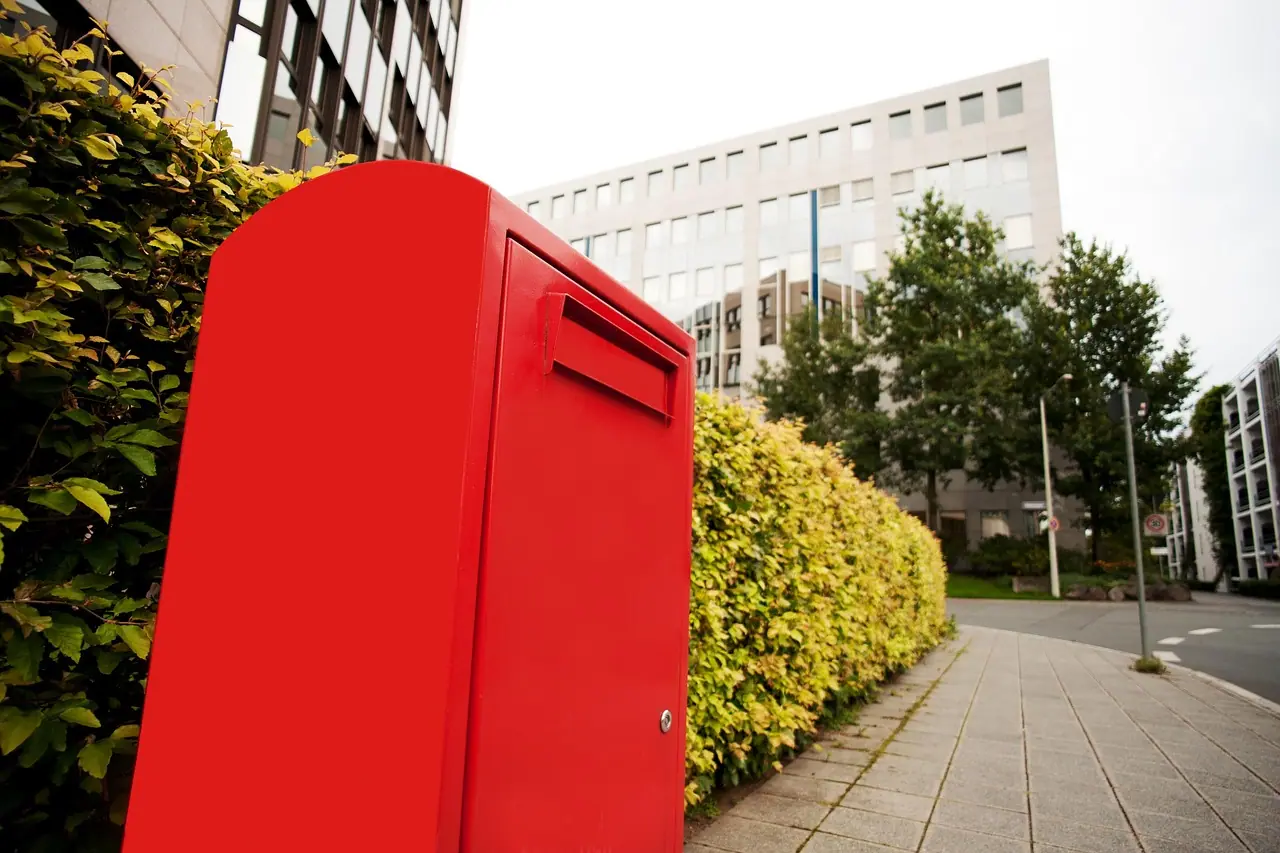 Photograph: letter box, post office, red