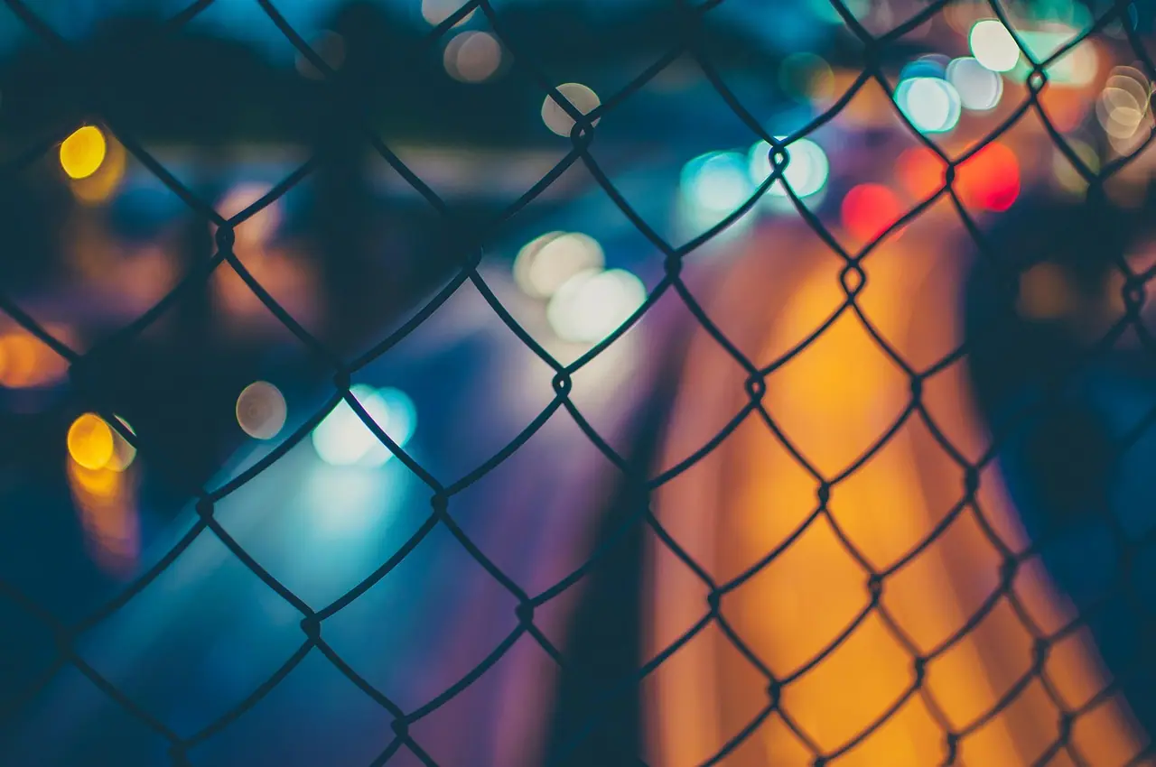 Photograph: fence, chain link, bokeh lights