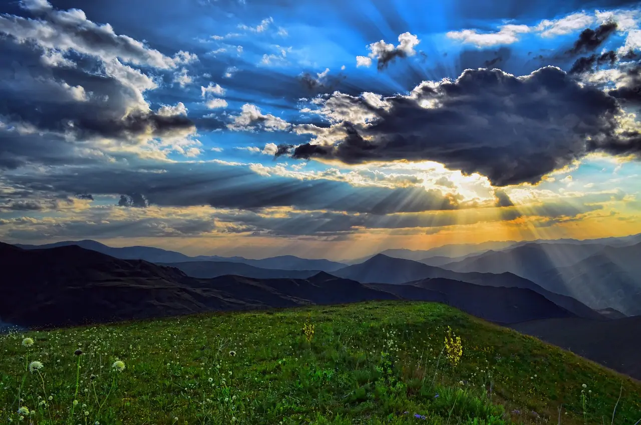 Photograph: mountains, field, clouds