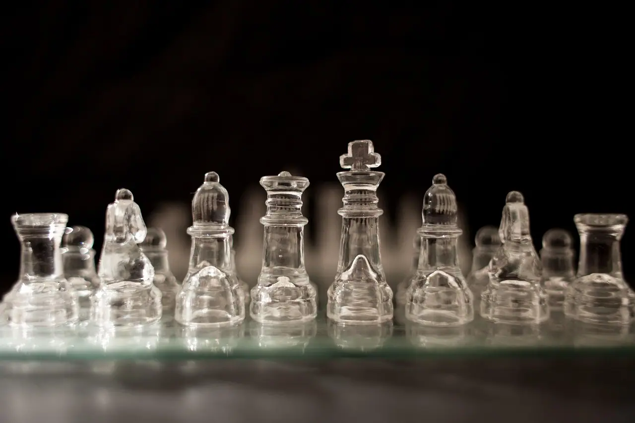 Photograph: chess pieces, glass, chessboard